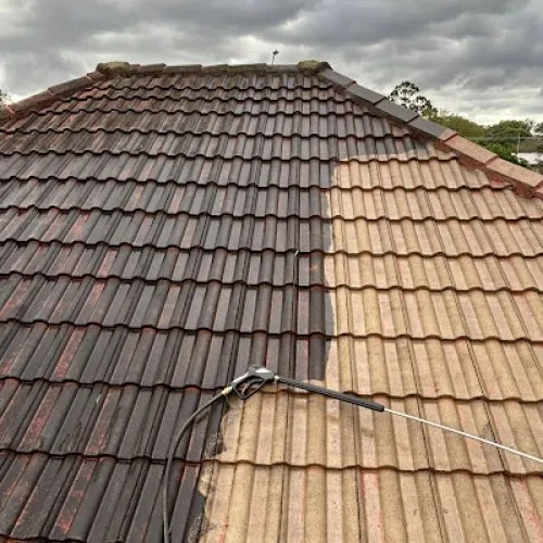 Partly cleaned or restored tiled roof image from the GTA Roofing website